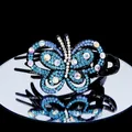 Elegante fermaglio per capelli a farfalla con strass blu su finitura nera - Blu