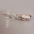 Pasador de pelo de oro rosa con cristales de colores sobre cartón de lujo - Estilo De Cinta / Multicolor