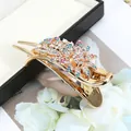 Golden flower hair clip with colorful rhinestones on a black jewelry box display - Multicolor Sunflower (Random)