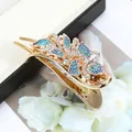 Elegante fermaglio per capelli dorato con strass blu e design floreale in cristallo - Floral Blue