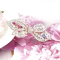 Eleganter Haarclip mit bunten Kristallen auf Roségold für ein anmutiges Styling - Schleife / Schleife Mehrfarbig
