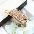 Sparkling champagne rhinestone flower hair claw clip with golden alloy finish - Floral Champagne