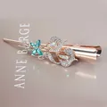 Fermaglio per capelli oro rosa con cristalli floreali verde acqua e strass lucidi - Stile bouquet / Blu