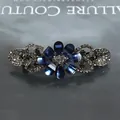 Vintage floral hair clip with blue crystal petals and rhinestone butterfly wings - Blue Daisy Flower