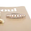 Rose gold hair clip with white pearls and sparkling rhinestones in an oval shape - Pea-shaped