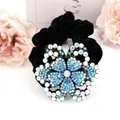 Coletero de terciopelo negro con decoración floral de diamantes azules para el cabello - Azul