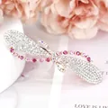 Bow hair clip in rose gold alloy with pink and white rhinestones on pink decor - Ribbon Red