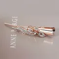 Rose gold rhinestone bow hair clip featuring intricate floral vine patterns and sparkling gems - Ribbon Style / Champagne