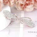 Sparkling rose gold rhinestone bow hair clip with crystal-studded asymmetrical design - White With Printed Ribbon