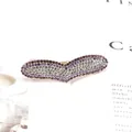 Elegante pinza de corazón con cristales morados y blancos sobre base de metal dorado - Corazón / Púrpura