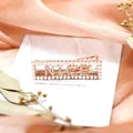 Rose gold hair clip with white pearls and NICE rhinestone letters on duckbill pin - Nice