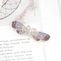 Pinza mariposa brillante con pedrería degradada en violeta y blanco sobre base oro - Mariposa / Púrpura