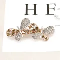 Elegant rose gold double butterfly hair clip featuring champagne crystals and rhinestones - Double Butterfly Yellow