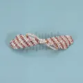Eleganter Haarschmuck Schleife mit lila und weißen Kristallen auf Goldbasis - Streifenstil / Lila