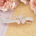 Elegant rose gold crystal hair clip with ribbon bow and interlocking double hearts - Cymbidium White