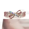 Sparkling pink rhinestone bow hair clip with rose gold spring barrette mechanism - Pink with Ribbon