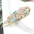 Elegant gold flower hair claw clip with blue gems and white crystals for hair styling - Morning Glory Blue
