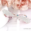 Bow-shaped crystal hair clip with pink gradient rhinestone chains on rose gold base - Ribbon Multi-Color (Random)
