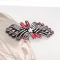 Elegant vintage bow hair clip with pink and white rhinestones on dark alloy metal base - Camellia Red