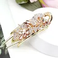 Floral hair clip with gold metal frame, white rhinestones and champagne crystals - Morning Glory Champagne