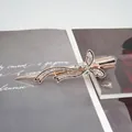 Elegante fermaglio per capelli a farfalla in oro rosa con cristalli e design a fiocco lungo - Bianco