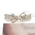 Elegant silver bow hair clip with sparkling rhinestones and colorful AB crystals - White With Printed Ribbon