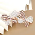 Elegant butterfly hair clip with purple and white rhinestones on a gold metal base - No.1 Double Butterfly Style (4899617091816)