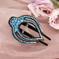 Pince à cheveux ethnique noire avec cristaux bleu clair sur satin rose - Bleu