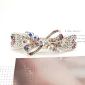 Elegant spring hair clip with layered bow design and colorful rhinestones in gold finish - Ribbon Multicolor (Random)