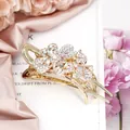 Golden lilac flower hair claw clip with rhinestones and acrylic floral details - White