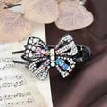 Vintage butterfly hair claw with colorful rhinestones on a dark resin base for women - Multicolor (Random)