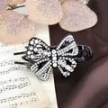 Elegant black butterfly hair claw clip with sparkling rhinestones for high-end hairstyling - White