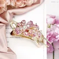 Pink floral hair claw clip with crystals and gold finish for elegant styling - Red