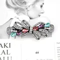 Sparkling bow hair clip with colorful crystals and pavé rhinestones on black metal - Wisteria Multicolor