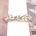 Golden spring hair clip featuring pink, blue and white crystal flowers in bow shape - Symmetrical Bow Structure / Colorful Orchid (Random)