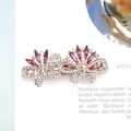 Elegant butterfly hair clip with purple crystals and sparkling rhinestones in gold finish - Bright Red Double Butterfly