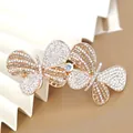 Golden butterfly hair clip with champagne rhinestones and crystal accents on a white base - No.1 Double Butterfly Style (4984767823810)