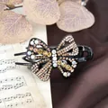 Pinza para el pelo con diseño de mariposa vintage y pedrería en color champán - Champán