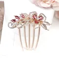 Rose gold flower hair comb with red crystals and white rhinestones for wedding styling - Red