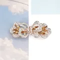 Elegant silver butterfly hair clip with white crystals and amber rhinestones - Ginger Yellow Iris