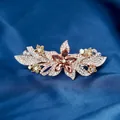 Champagne crystal flower hair clip with rose gold rhinestones on navy satin - Star Yellow
