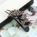 Elegant black butterfly hair clip with shimmering dark rhinestones for women - Butterfly Design / Butterfly Champagne