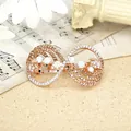 Infinity rose gold hair clip with champagne crystals and aurora stones on vintage score - Scallop Champagne
