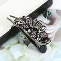 Pince à cheveux fleur noire élégante avec strass champagne pour queue de cheval - Floral Champagne