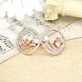 Elegant rose gold spring hair clip with shimmering infinity rhinestones and white gems - Scallop White