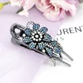 Elegant flower hair claw clip in gunmetal finish with sparkling blue and white crystals - Flower Blue