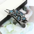 Barrette à cheveux raffinée en métal noir avec fleurs en strass dégradé bleu et blanc - Trèfle Bleu