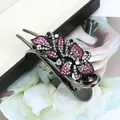 Pince à cheveux papillon noire avec strass roses et blancs pour une coiffure élégante - Floral Rouge