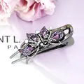 Purple crystal flower hair claw clip with rhinestones and black gunmetal finish - Peacock Purple