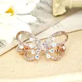Elegant butterfly hair clip with champagne crystals and sparkling rhinestones on rose gold base - Butterfly Champagne